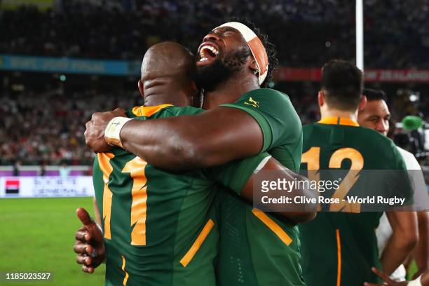 Siya Kolisi of South Africa celebrates victory with Makazole Mapimpi of South Africa following the Rugby World Cup 2019 Final between England and...