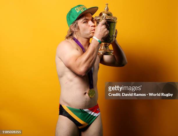 Faf de Klerk of South Africa poses for a portrait with the Web Ellis Cup following his team's victory against England in the Rugby World Cup 2019...