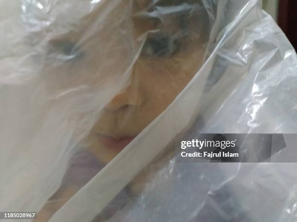 little girl inside plastic - kidnapping girls stock pictures, royalty-free photos & images