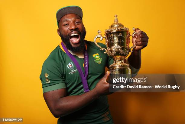 Tendai Mtawarira of South Africa poses for a portrait with the Web Ellis Cup following his team's victory against England in the Rugby World Cup 2019...