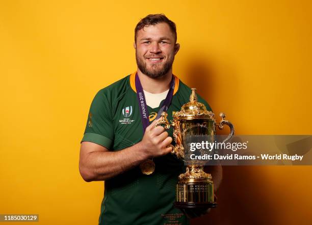 Duane Vermeulen of South Africa poses for a portrait with the Web Ellis Cup following his team's victory against England in the Rugby World Cup 2019...