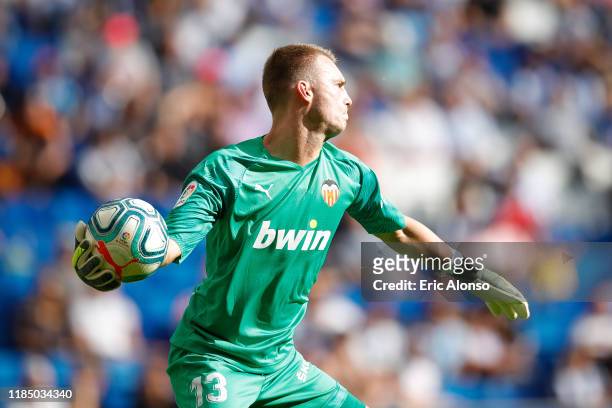 Jasper Cillessen of Valencia CF passes the ball during the Liga match between RCD Espanyol and Valencia CF at RCDE Stadium on November 02, 2019 in...