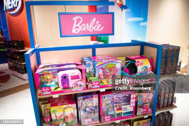 Mattel Inc. Barbie brand toys sit on display at a Toys "R" Us Inc. Store in Paramus, New Jersey, U.S., on Tuesday, Nov. 26, 2019. The new store in...