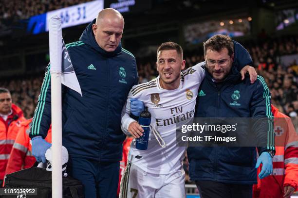 Eden Hazard of Real Madrid is injured during the UEFA Champions League group A match between Real Madrid and Paris Saint-Germain at Bernabeu on...