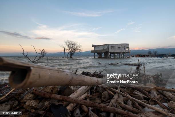 The view of the beach and houses submerged by the tidal flood in Kampung Lere Beach, Palu Bay, Central Sulawesi, Indonesia, on November 27, 2019. The...