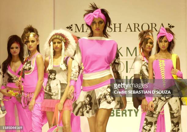 Indian models display creations by designer Manish Arora on the third day of the Lakme India Fashion Week in Bombay, 20 July 2003. The Fashion Week,...