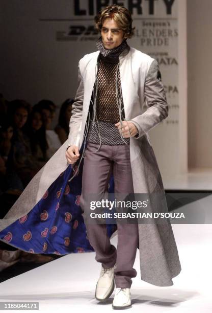 Model displays a creation of designer Rohit Bal at the Lakme India Fashion Week in Bombay,19 July 2003. The Fashion Week, India's annual designer...