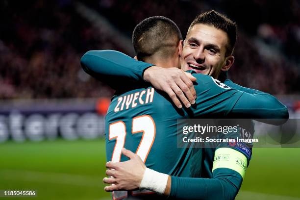 Hakim Ziyech of Ajax celebrates 0-1 with Dusan Tadic of Ajax during the UEFA Champions League match between Lille v Ajax at the Stade Pierre Mauroy...