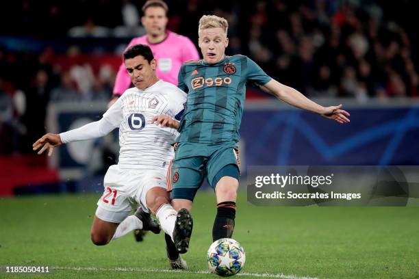 Benjamin Andre of Lille, Donny van de Beek of Ajax during the UEFA Champions League match between Lille v Ajax at the Stade Pierre Mauroy on November...