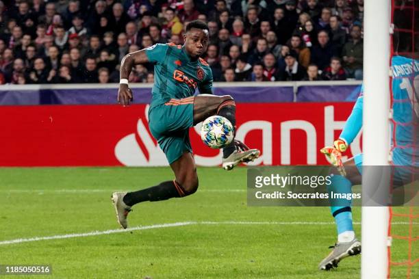 Quincy Promes of Ajax scores the second goal to make it 0-2 during the UEFA Champions League match between Lille v Ajax at the Stade Pierre Mauroy on...