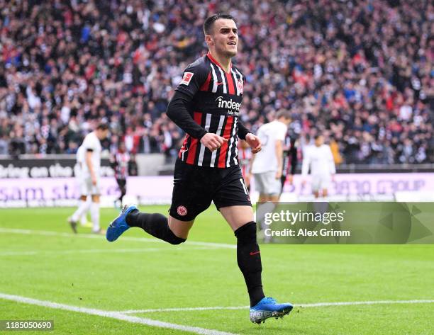 Filip Kostic of Eintracht Frankfurt celebrates after scoring his team's first goal during the Bundesliga match between Eintracht Frankfurt and FC...