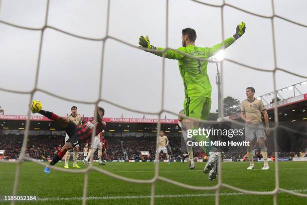 Joshua King of Bournemouth volleys the ball past David De Gea of Manchester United to score the winning goal during the Premier League match between...