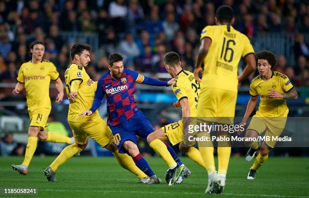 Lionel Messi of Barcelona in action surrounded by players of Borussia Dortmund during the UEFA Champions League group F match between FC Barcelona...