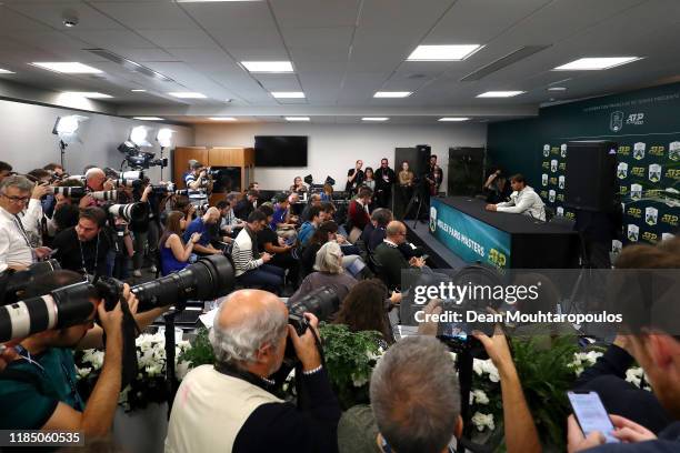 Rafael Nadal of Spain speaks to the media to announce he will not be able to play his semi finals match against Denis Shapovalov of Canada on day 6...