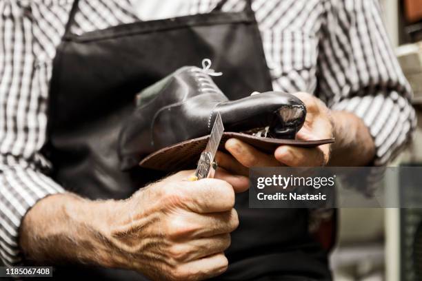 shoemaker - shoemaker stock pictures, royalty-free photos & images
