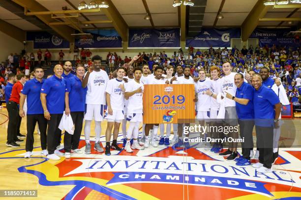 The Kansas Jayhawks pose for a photo after winning the championship game of the 2019 Maui Invitational against the Dayton Flyers at the Lahaina Civic...