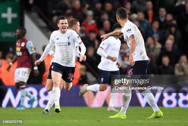 Andy Robertson of Liverpool celebrates after scoring his team's first goal during the Premier League match between Aston Villa and Liverpool FC at...