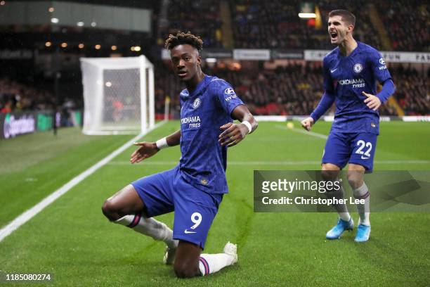 Tammy Abraham of Chelsea celebrates with Christian Pulisic after scoring his team's first goal during the Premier League match between Watford FC and...