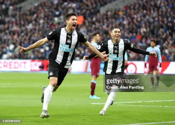 Federico Fernandez of Newcastle United celebrates after scoring his sides second goal with Miguel Almiron of Newcastle United during the Premier...