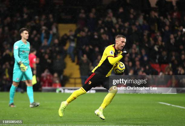 Gerard Deulofeu of Watford celebrates after scoring his team's first goal during the Premier League match between Watford FC and Chelsea FC at...