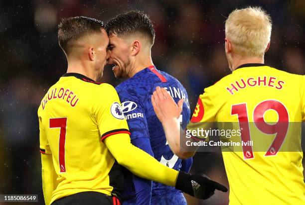 Jorginho of Chelsea clashes with Gerard Deulofeu of Watford during the Premier League match between Watford FC and Chelsea FC at Vicarage Road on...