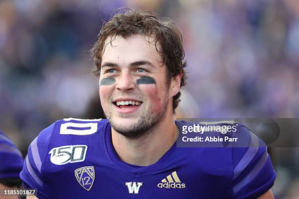Jacob Eason of the Washington Huskies smiles after throwing a 34 yard touchdown pass against the Utah Utes in the second quarter during their game at...