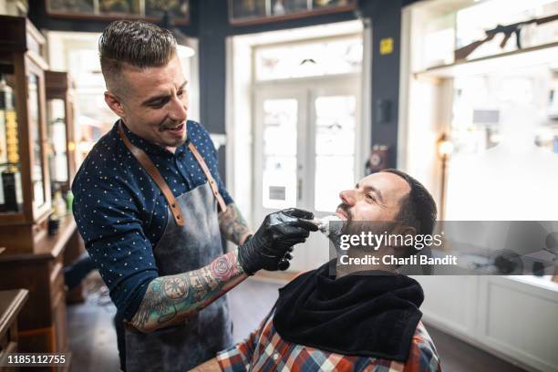 shaving cream softens the beard - shave barber stock pictures, royalty-free photos & images