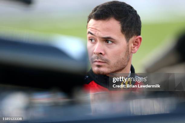 Kyle Larson, driver of the McDonald's Chevrolet, stands on the grid during the Salute to Veterans Qualifying Day Fueled by The Texas Lottery for the...