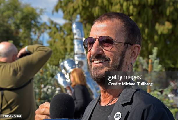 Musician Ringo Starr attends a public art dedication for his donated sculpture "Peace and Love" at Beverly Gardens Park on November 02, 2019 in...