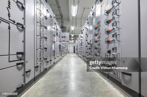 switch panel of switchgear electrical room at power plant. - stromkasten stock-fotos und bilder