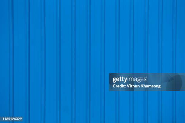 blue metal sheet roof, abstract background. - roof texture stock pictures, royalty-free photos & images