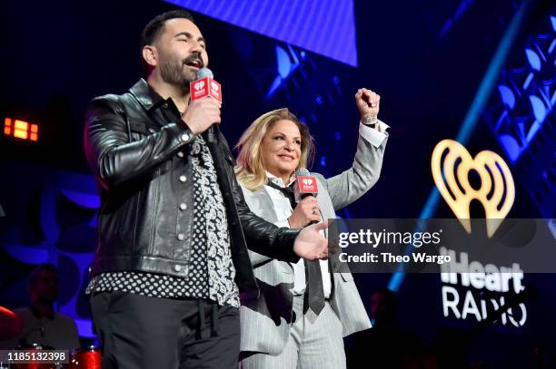 Enrique Santos and Ana Maria Polo perform onstage at the 2019 iHeartRadio Fiesta Latina at AmericanAirlines Arena on November 2, 2019 in Miami,...