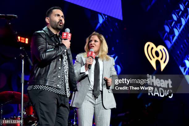 Enrique Santos and Ana Maria Polo perform onstage at the 2019 iHeartRadio Fiesta Latina at AmericanAirlines Arena on November 2, 2019 in Miami,...