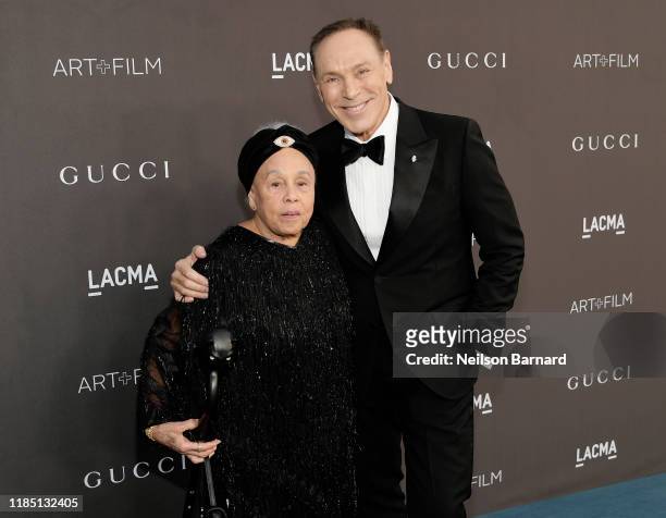Betye Saar, wearing Gucci, and Neil Lane attend the 2019 LACMA Art + Film Gala Presented By Gucci at LACMA on November 02, 2019 in Los Angeles,...