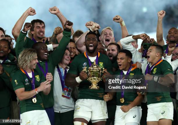 Siya Kolisi, the South Africa captain, celebrates with team mates after their victory during the Rugby World Cup 2019 Final between England and South...