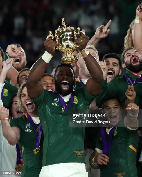 Siya Kolisi, the South Africa captain, raises the Webb Ellis Cup after their victory during the Rugby World Cup 2019 Final between England and South...