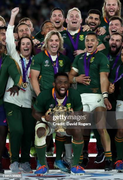 Siya Kolisi, the South Africa captain, raises the Webb Ellis Cup after their victory during the Rugby World Cup 2019 Final between England and South...