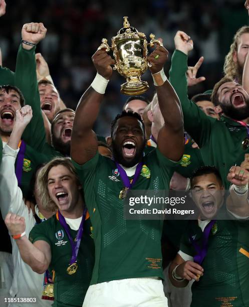 Siya Kolisi, the South Africa captain, raises the Webb Ellis Cup after their victory during the Rugby World Cup 2019 Final between England and South...