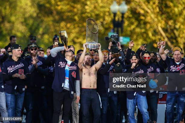 Brian Dozier of the Washington Nationals celebrates with his team mates during the World Series victory parade on November 02, 2019 in Washington, DC.