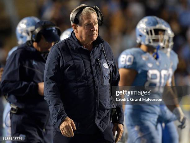 Head coach Mack Brown of the North Carolina Tar Heels watches him play against the Virginia Cavaliers during the second half of their game at Kenan...