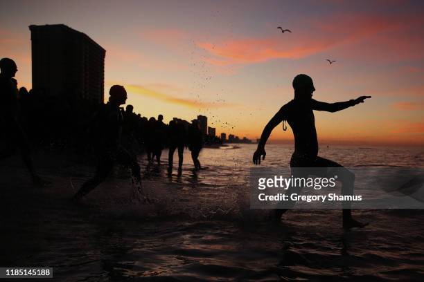 Athletes compete in the swim leg at the Ironman Florida on November 02, 2019 in Panama City, Florida.