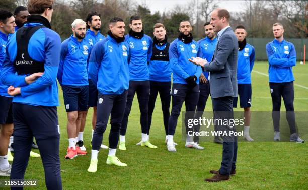 Prince William, Duke of Cambridge meets members of West Bromwich Albion FC's first team as part of the Heads Up campaign at West Bromwich Albion...