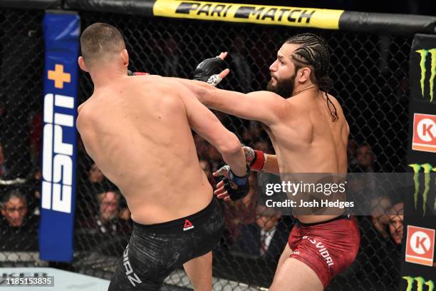 Jorge Masvidal punches Nate Diaz in their welterweight bout for the BMF title during the UFC 244 event at Madison Square Garden on November 02, 2019...