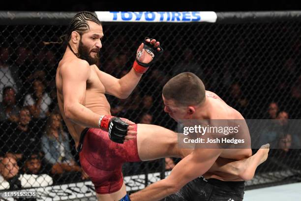 Jorge Masvidal kicks Nate Diaz in their welterweight bout for the BMF title during the UFC 244 event at Madison Square Garden on November 02, 2019 in...