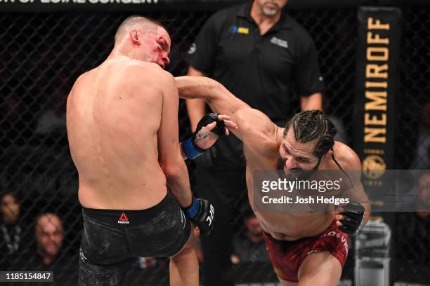 Jorge Masvidal punches Nate Diaz in their welterweight bout for the BMF title during the UFC 244 event at Madison Square Garden on November 02, 2019...