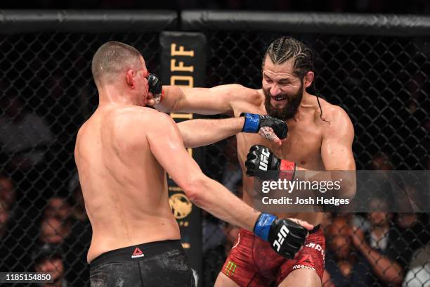 Jorge Masvidal and Nate Diaz exchange punches in their welterweight bout for the BMF title during the UFC 244 event at Madison Square Garden on...