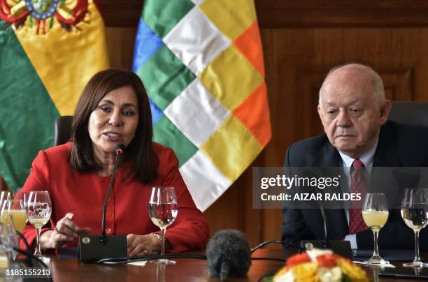 Bolivian Foreign Minister Karen Longaric and Bolivian appointed Ambassador to the US, Walter Serrate, speak during a conference with the...