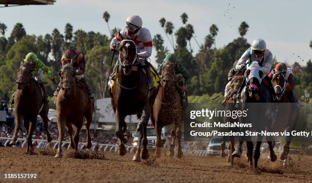 Jockey Ricardo Santana Jr. Riding Mitole wins the breeders Cup Sprint race as Jose Ortiz riding Shancelot finished second during the Breeders Cup...