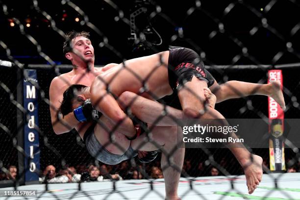 Kelvin Gastelum of the United States fights against Darren Till of the United Kingdom in the Middleweight bout during UFC 244 at Madison Square...