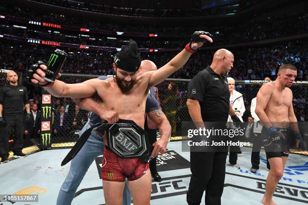 Jorge Masvidal celebrates his victory over Nate Diaz in their welterweight bout for the BMF title during the UFC 244 event at Madison Square Garden...